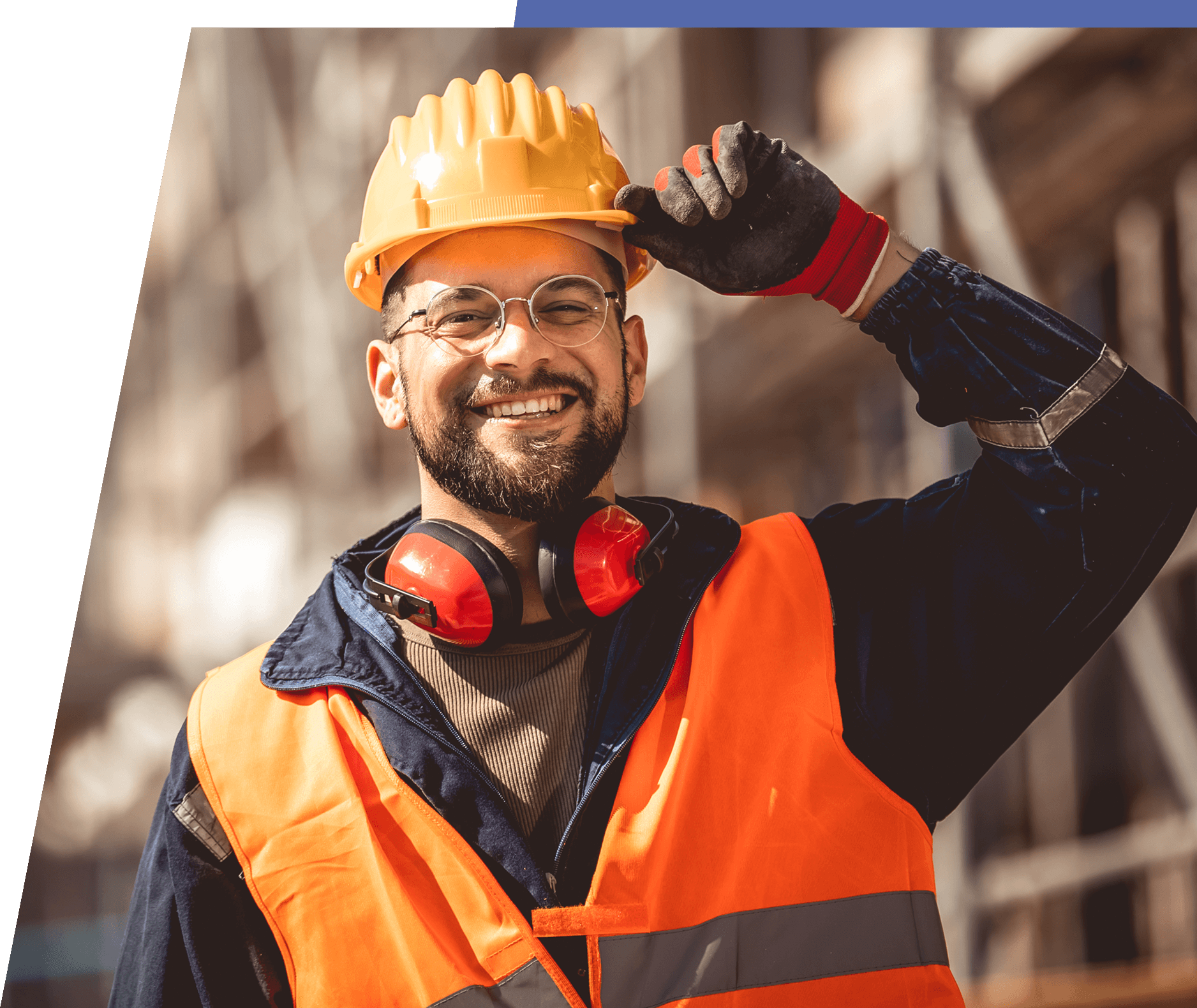 Construction worker holding his hat