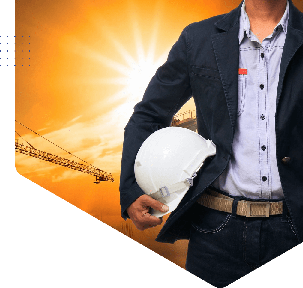 A man holding a hard hat in his hand.